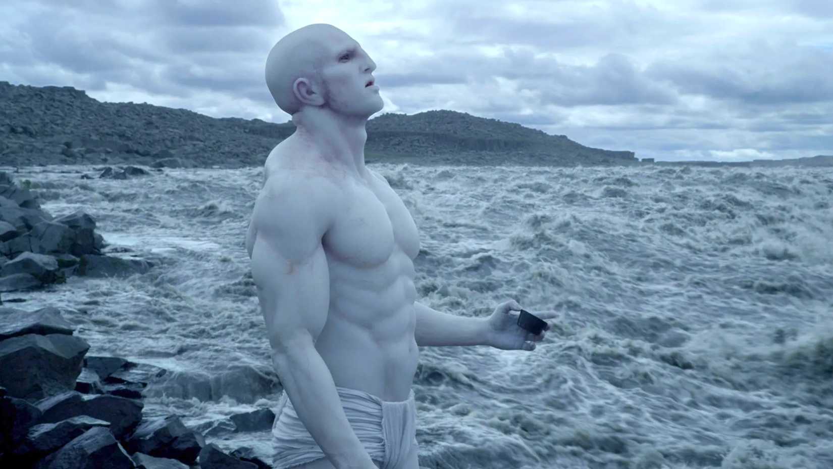 An engineer standing by water in Prometheus