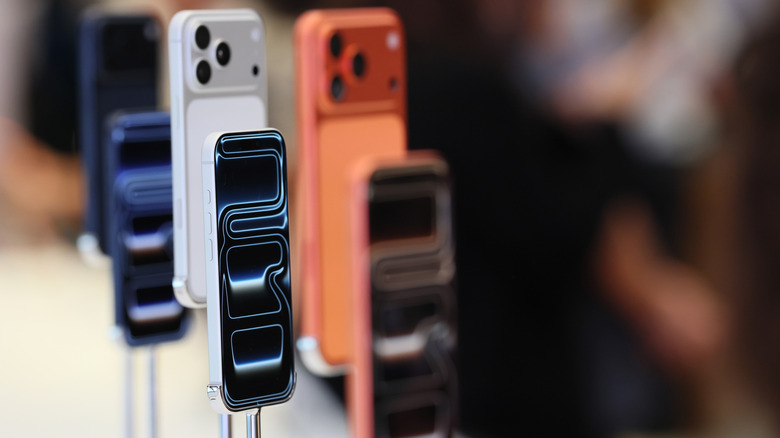 The iPhone 17 Pro models on display in a retail store.