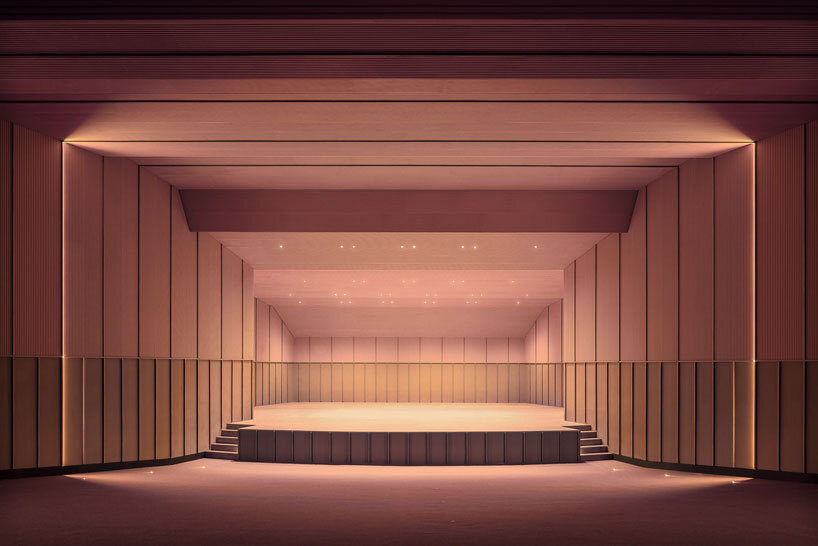 bright pink interior revitalizes adaptive acoustic music hall for sax’s cultural complex in spain