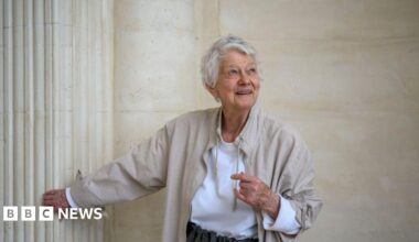 Family having a moment together messing about while winter sea swimming