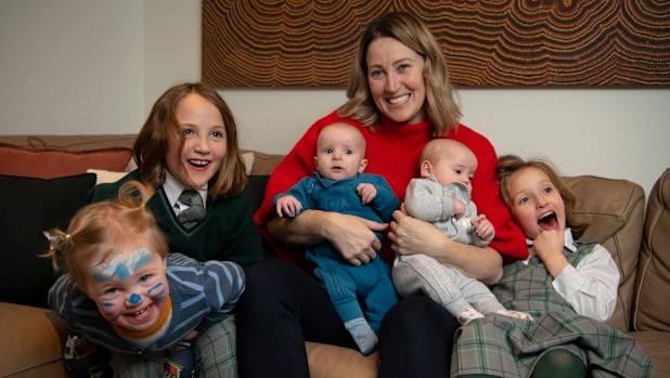 Jana Pittman, now a doctor with six children, with her family in 2022. 