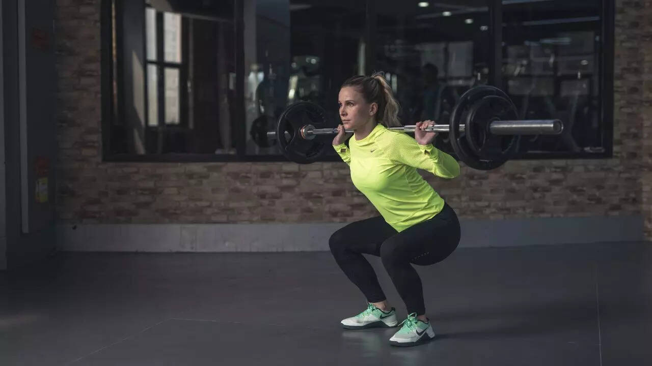 Deep butt to grass squats with heavy weight