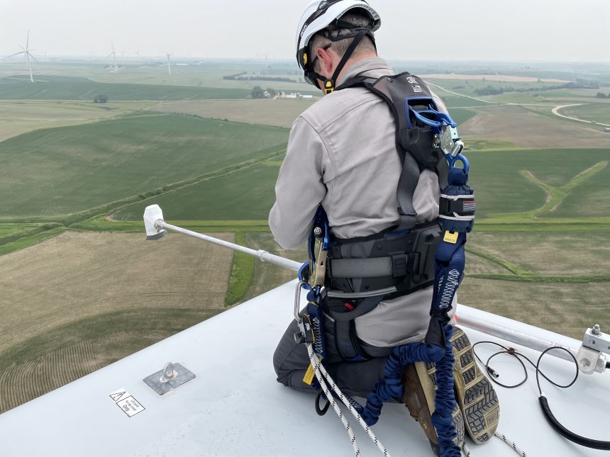 Installing an EchoSense sensor on a turbine.
