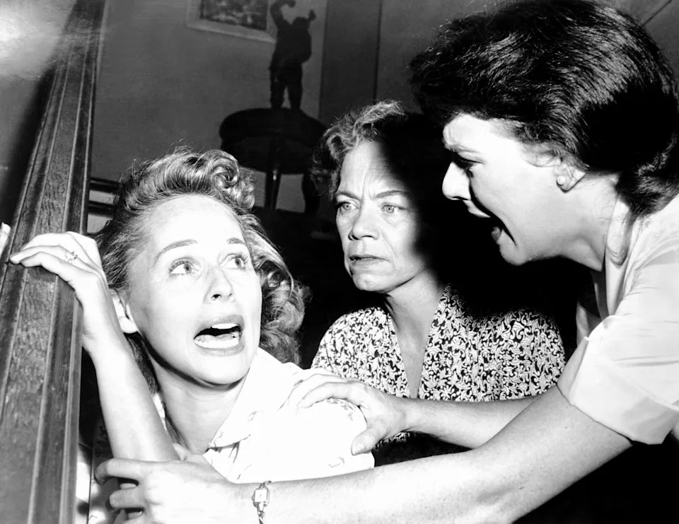 Dorothy Morris, Ellen Corby, and Jacqueline Scott appearing frightened in a tense scene
