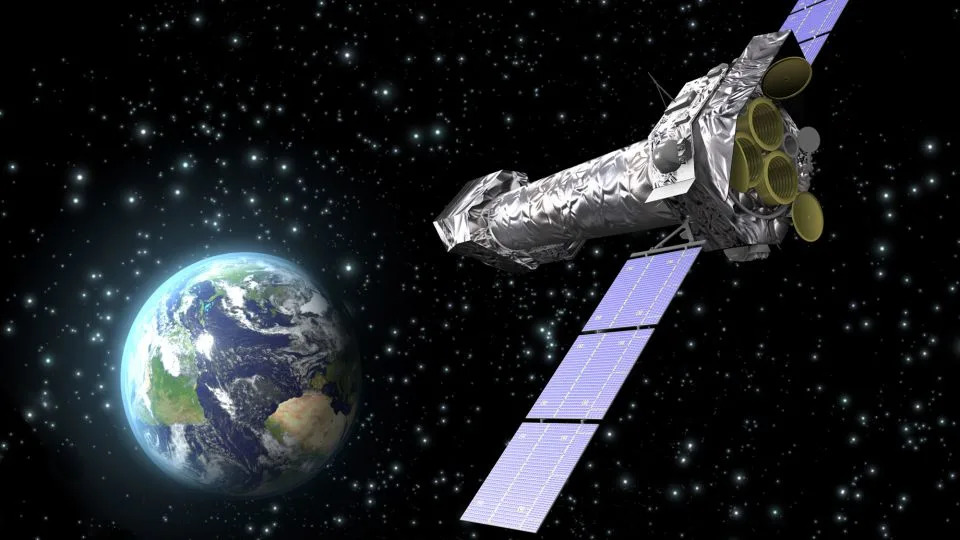 An artist's illustration depicts the XMM-Newton observatory in space. - ESA/C. Carreau