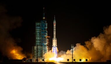 A photo of a Chinese rocket lifting off from a launch pad at night