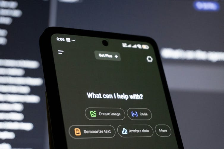 A smartphone screen displaying an AI screen reading 'What can I help with?'