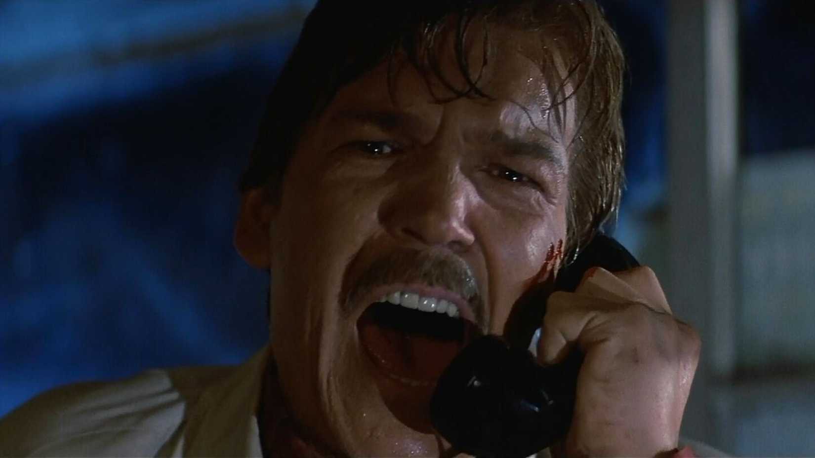 Tom Atkins screams into the telephone in the ending of Halloween III: Season of the Witch
