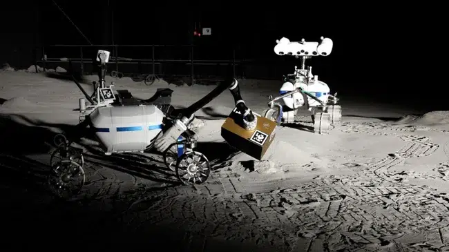 Two rovers from DLR, known as LRU2 (left) and LRU1 (right), hunt for water in a simulated lunar environment in Cologne, Germany. (Image credit: DLR (CC BY-NC-ND 3.0))
