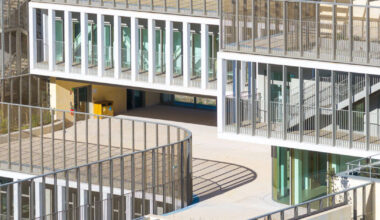 layered stone volumes sculpt school by brenac & gonzalez & associés