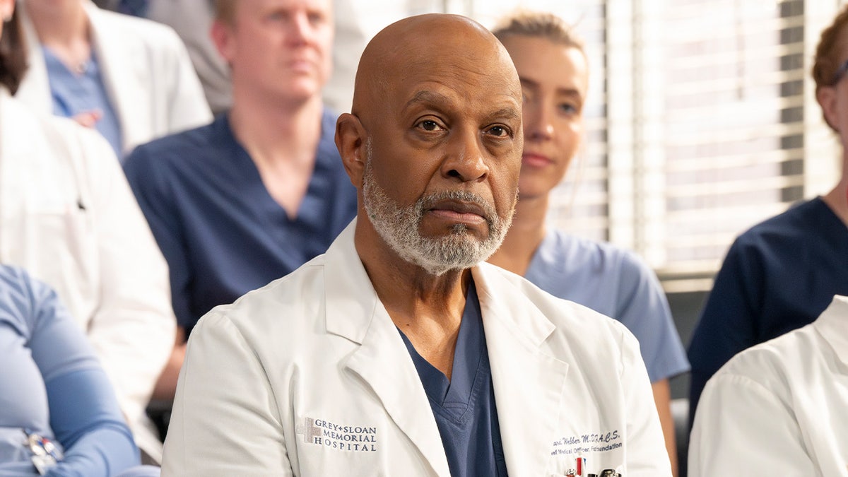 James Pickens Jr. wears white medical coat