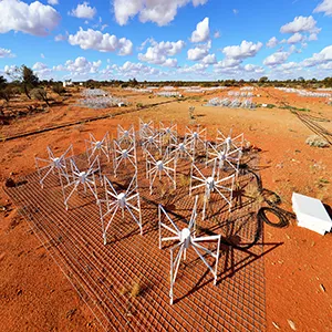 Antennas from the MWA telescope, on Wajarri Country in Western Australia. Credit: Dragonfly Media