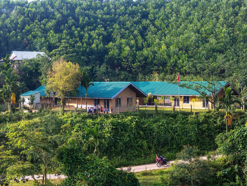 vo trong nghia builds school from rammed earth and bamboo in mountain region of vietnam