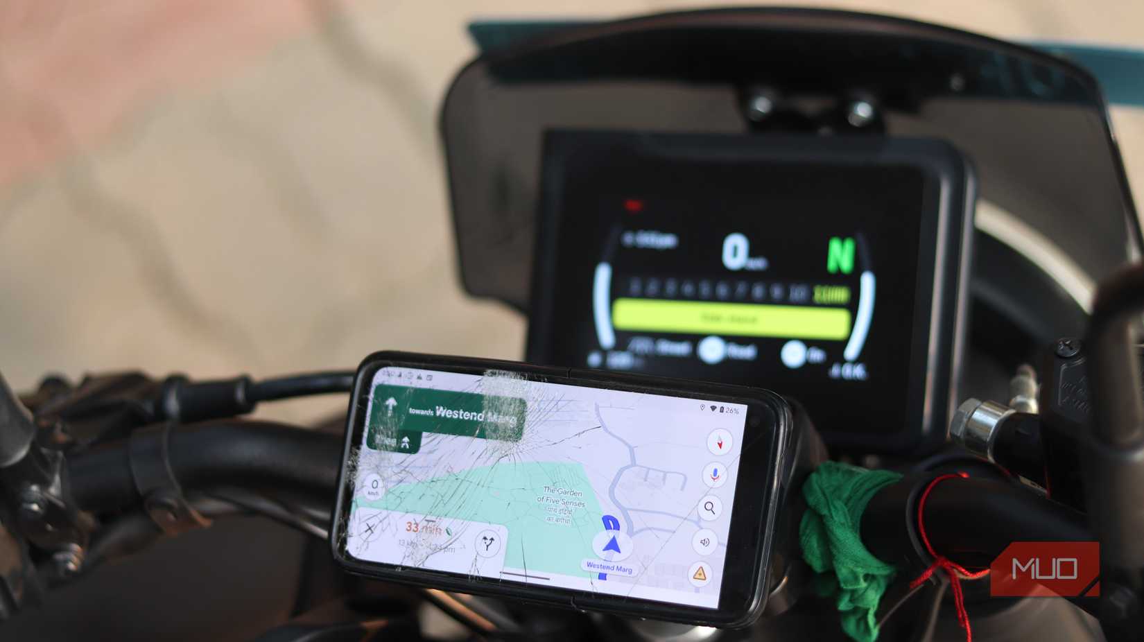 Pixel 4a mounted on a bike with Google Maps open.