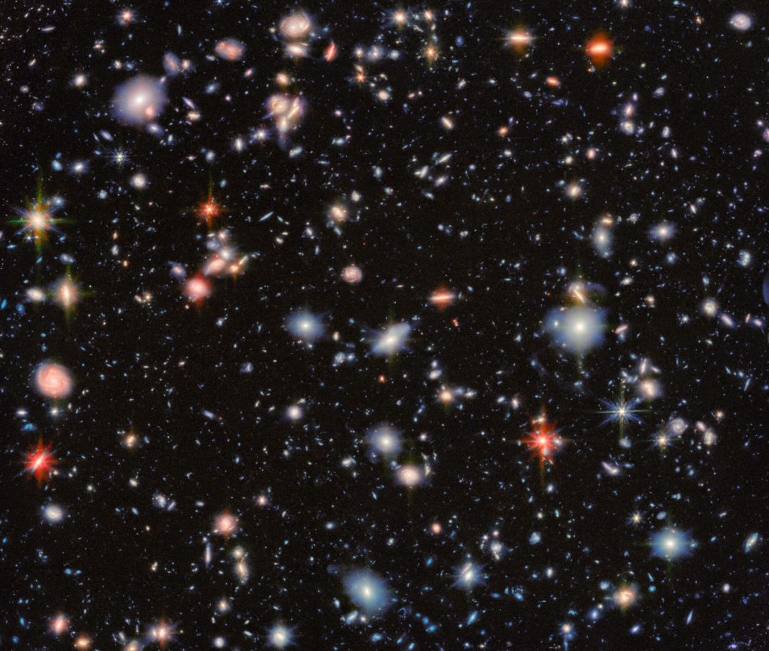 This detailed view from the James Webb Space Telescope reveals thousands of distant galaxies, some dating back to the earliest periods of cosmic history.