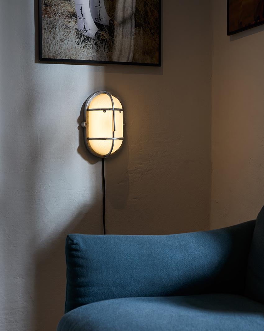 philippe tabet reimagines industrial bulkhead lamp as face-like lighting fixture