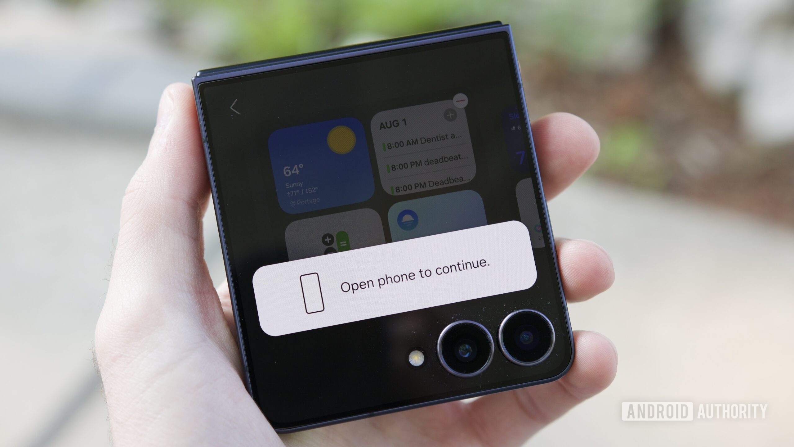 "Open phone to continue" pop up on the Galaxy Z Flip 7 cover screen.
