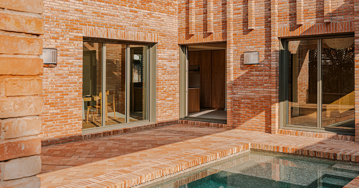 SIGLA studio organizes brick residence around two patios in spain