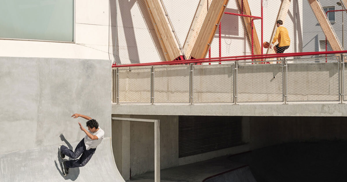 cantilever sports court crowns urban skatepark bowl along railway in france