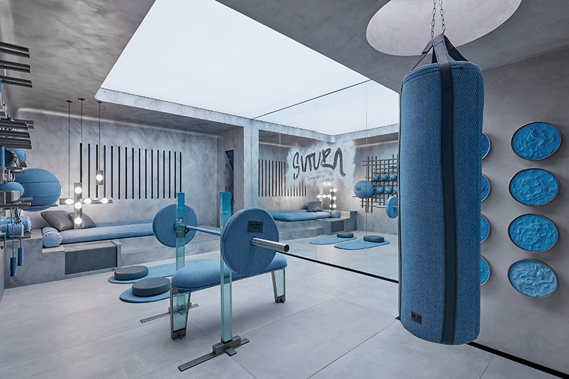 denim wraps workout equipment within sutura sculptural gym in mexico