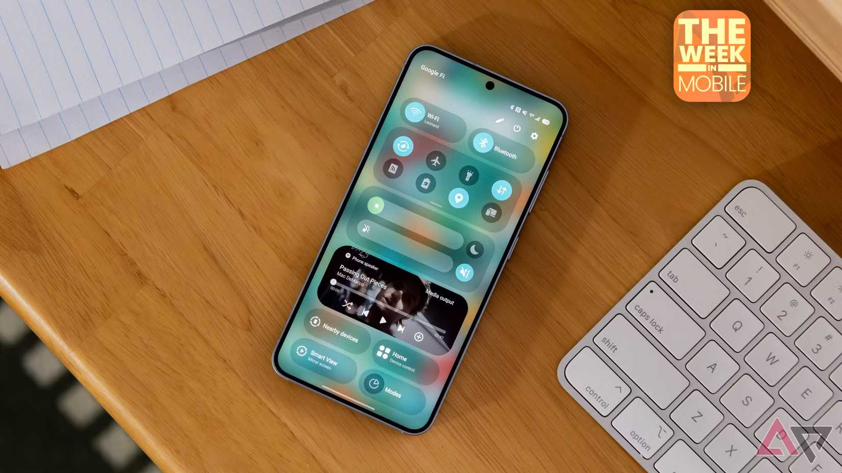 The Samsung Galaxy S25 on a desk, showing its quick settings panel.