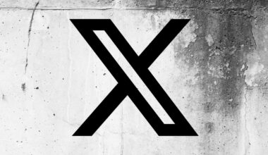 X (formerly Twitter) logo on a cracked wall