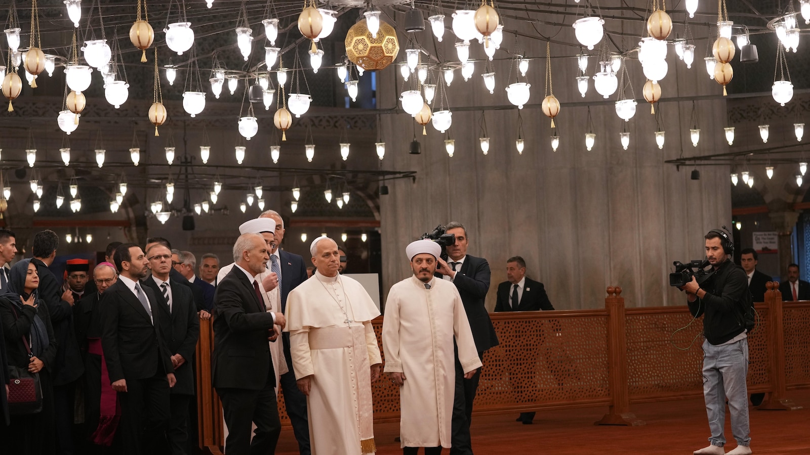 Pope visits Istanbul's Blue Mosque at start of day of meetings with Turkey's religious leaders