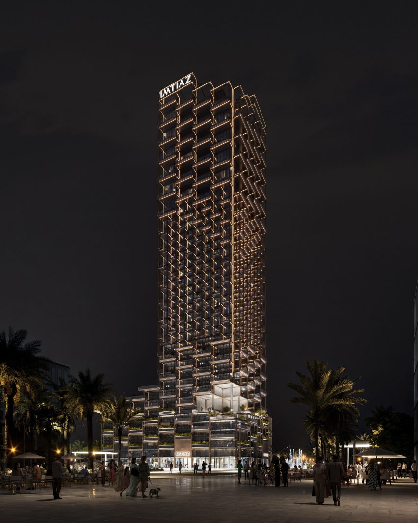 Residential skyscraper at night by Zaha Hadid Architects