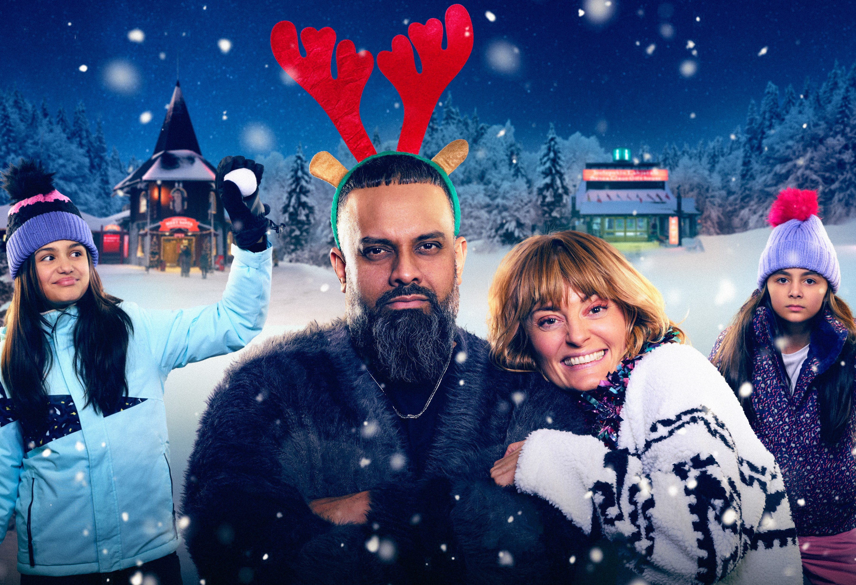 Promotional image for "Stuffed" showing two adults and two children in winter clothing, standing in a snowy landscape with festive buildings.