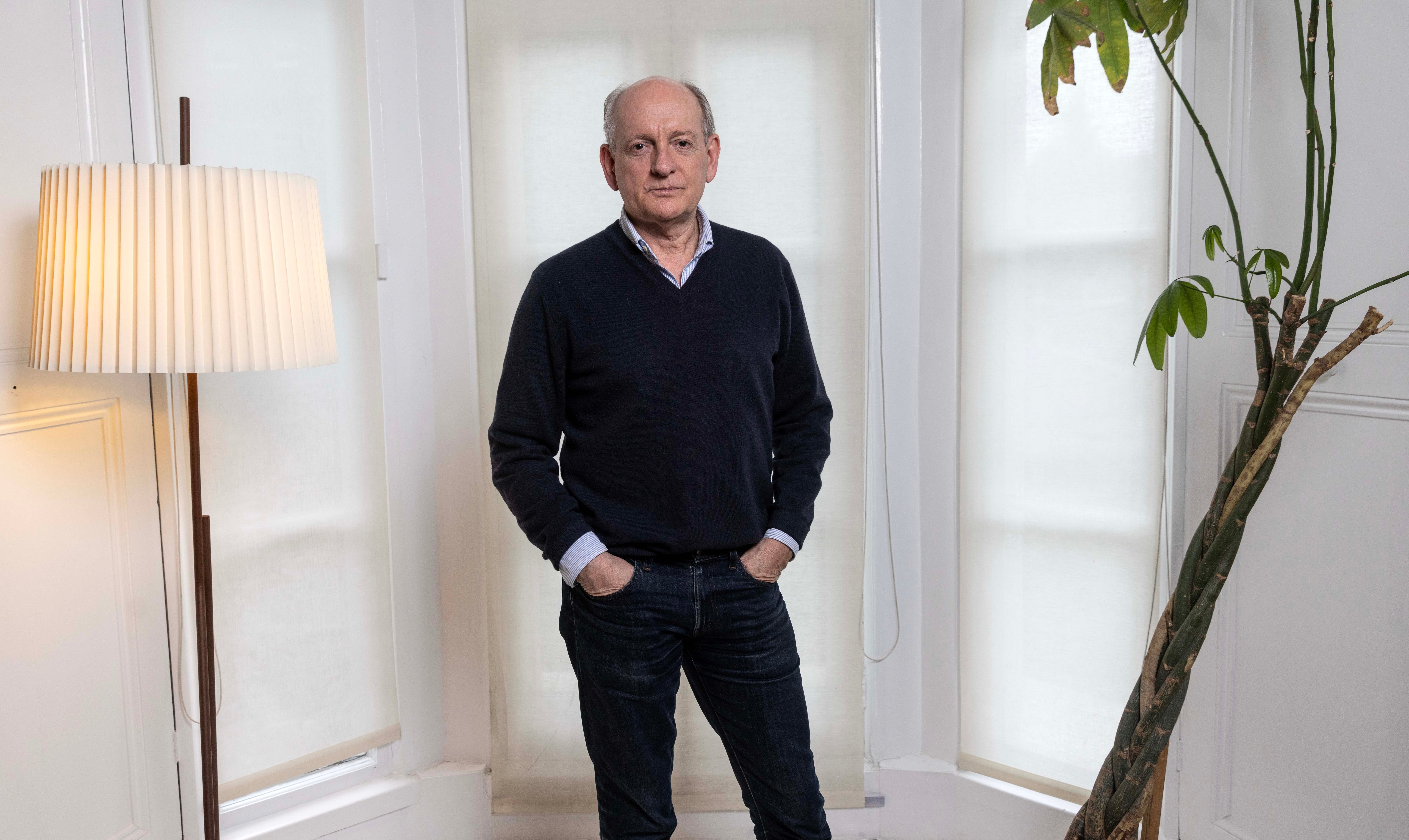 Stuart Jonathan Russell, a British computer scientist and professor, standing with hands in pockets.