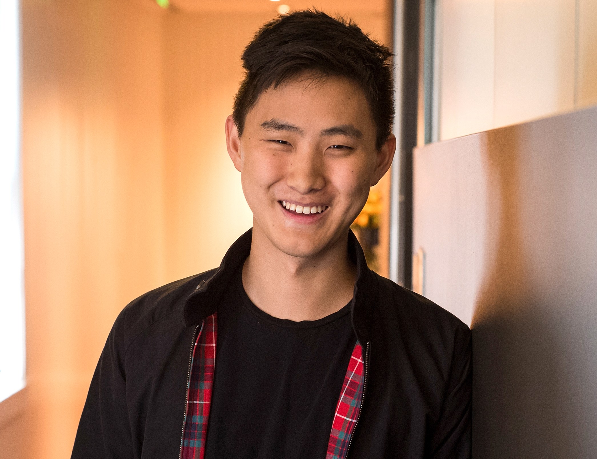 Alexandr Wang, co-founder and CEO of Scale AI, smiling.