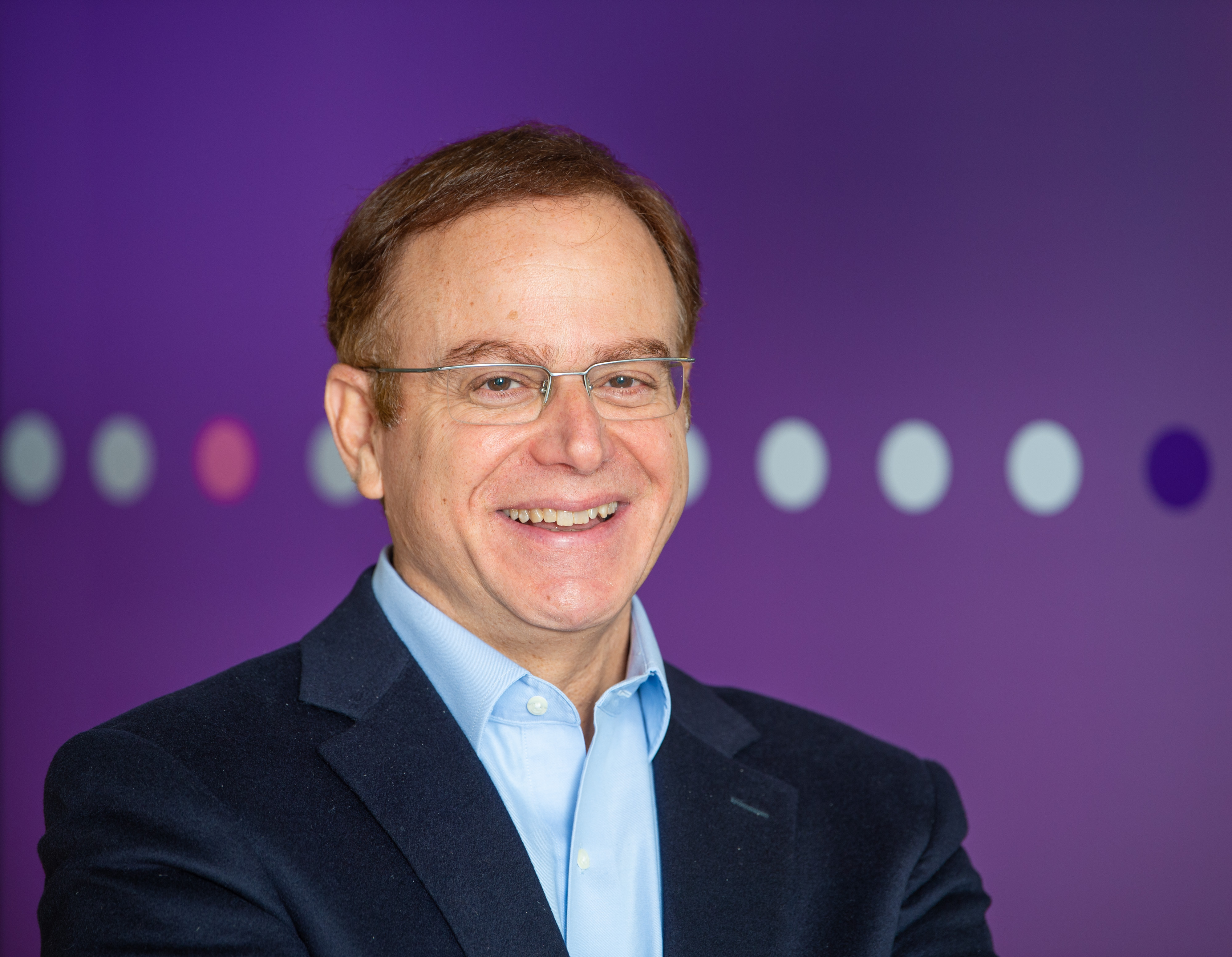 Karim Bitar, CEO of Convatec, smiling at the camera.