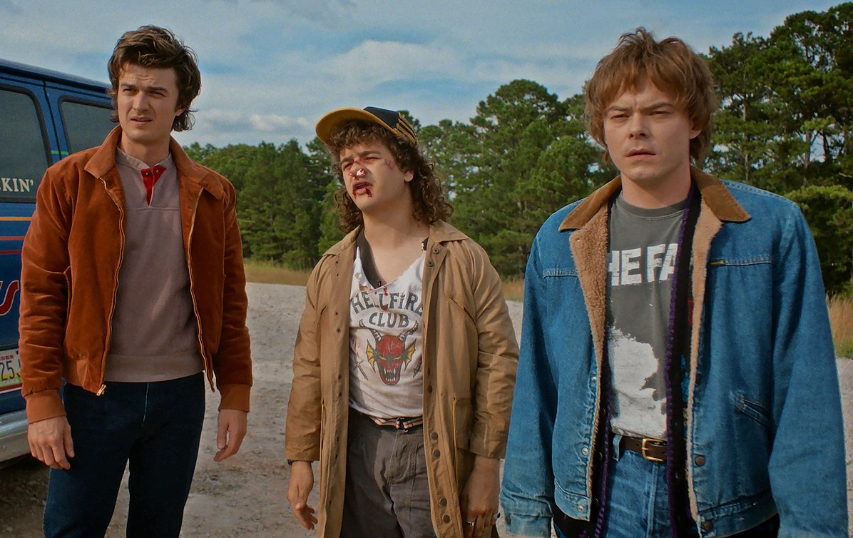 Joe Keery as Steve Harrington, Gaten Matarazzo as Dustin Henderson, and Charlie Heaton as Jonathan Byers in Stranger Things: Season 5.