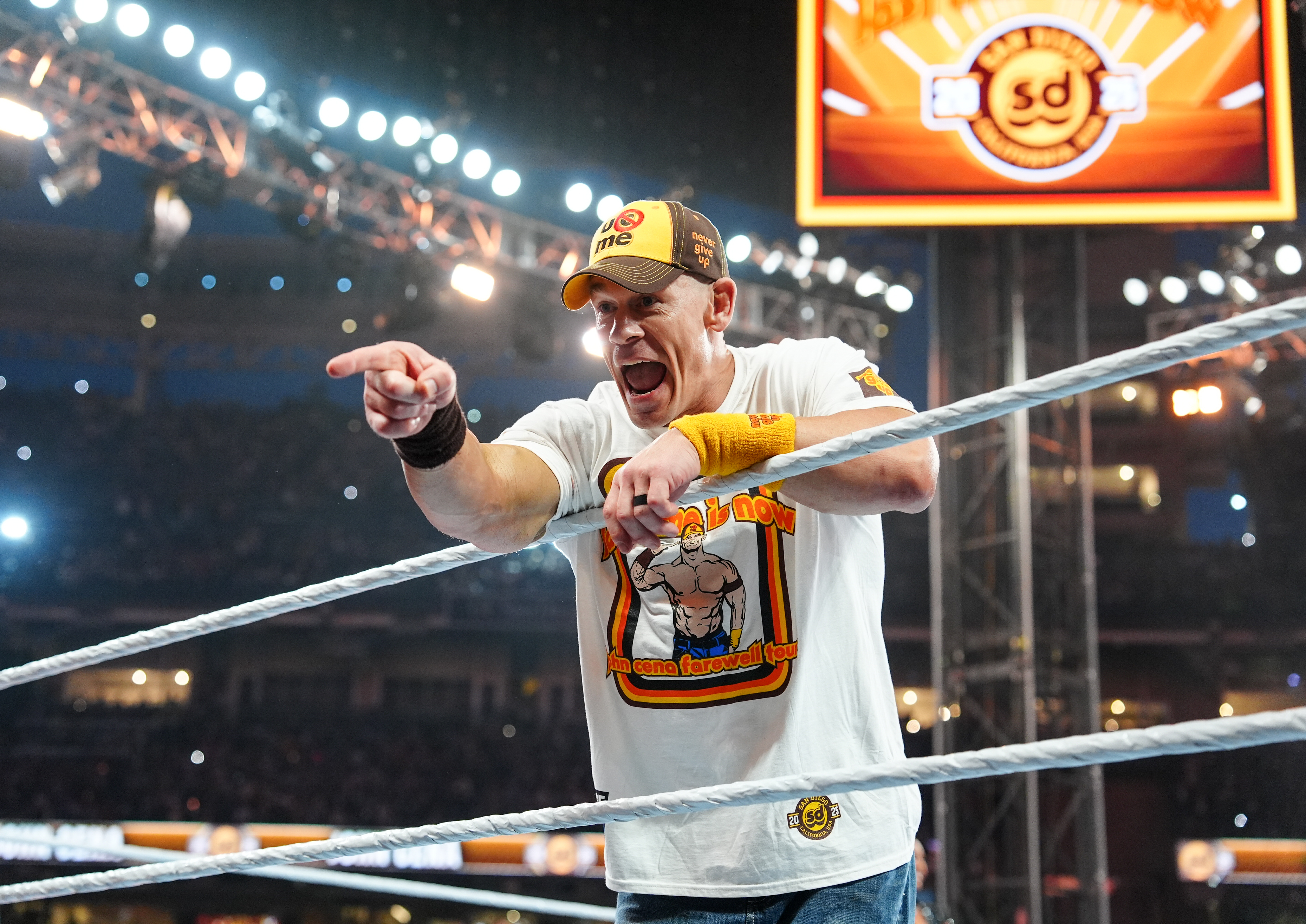 John Cena entering the ring during Survivor Series, pointing with an open mouth.