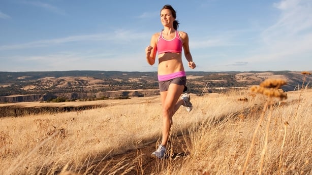 A woman running outdoors