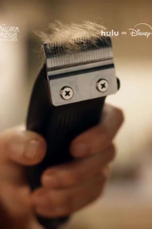 Electric razor with hair in it