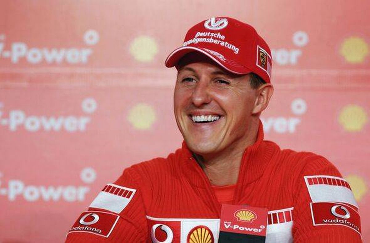 Michael Schumacher smiling at F1 press conference