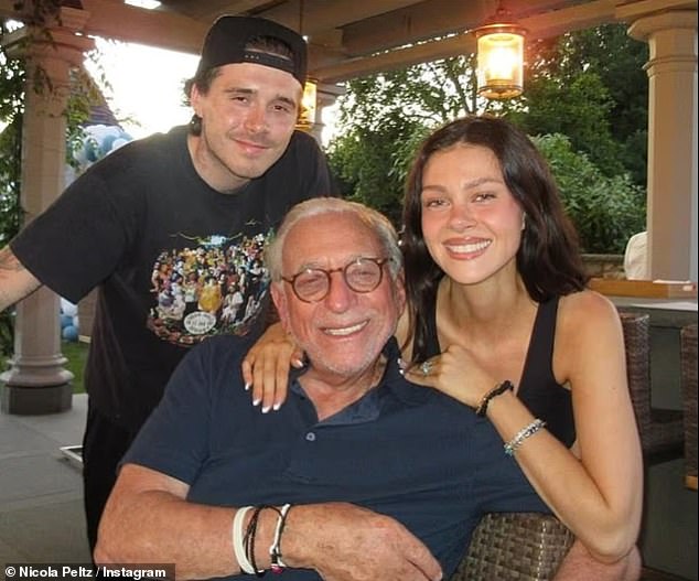 Nicola's parents Nelson (pictured) and Claudia are said to be 'excited' to have Brooklyn over the festive period (seen in July)