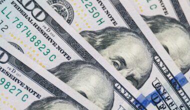 Dollar slides as Fed dents hawks, markets eye two more rate cuts