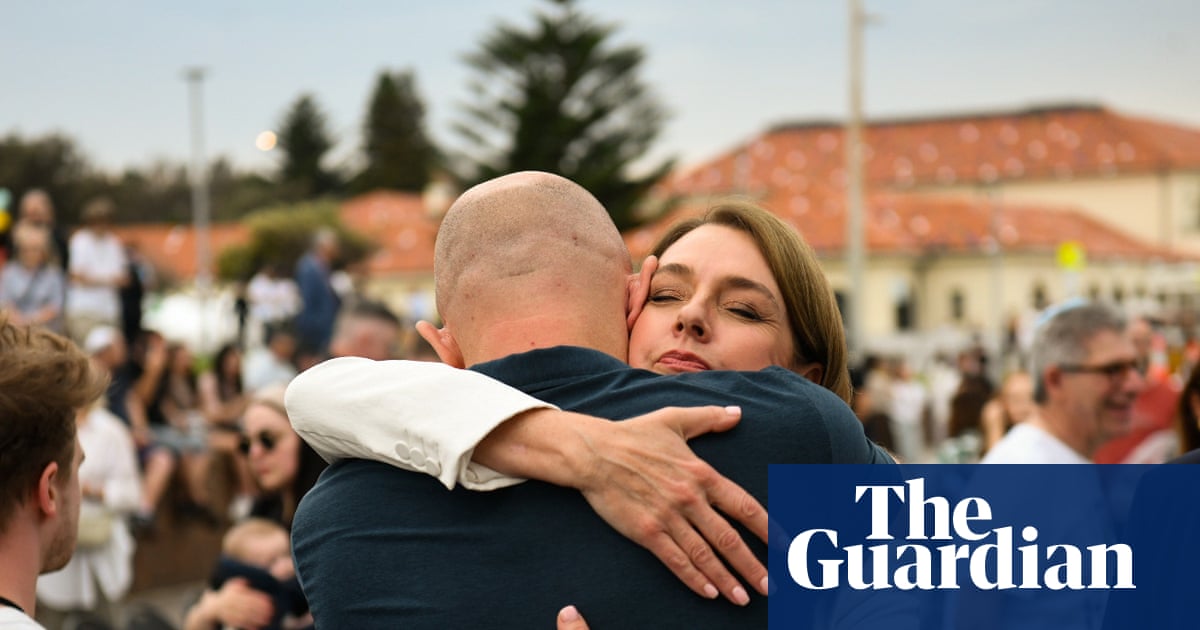‘We are unbreakable’: defiance marks Bondi attack commemoration after PM is booed | Bondi beach terror attack