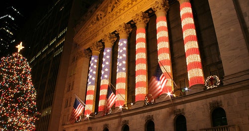 U.S. stocks hover at record highs in quiet trading after the Christmas holiday