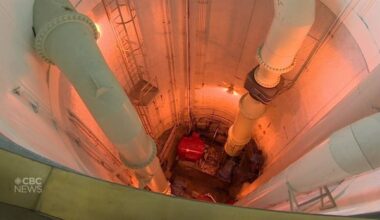 In Winnipeg, a distant light flickers at the end of a sewage-treatment tunnel