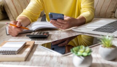 Woman Setting Financial Goals at Home. stock photo