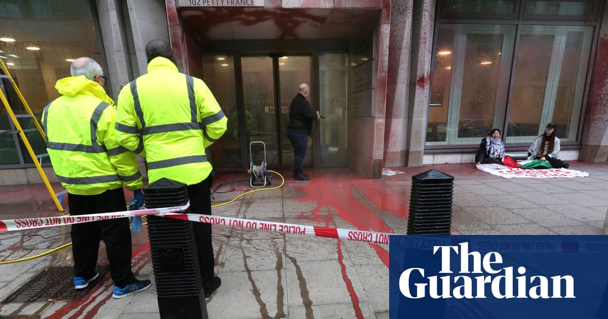 Pro-Palestine activists daub MoJ building with red paint in protest over hunger strikers | UK news
