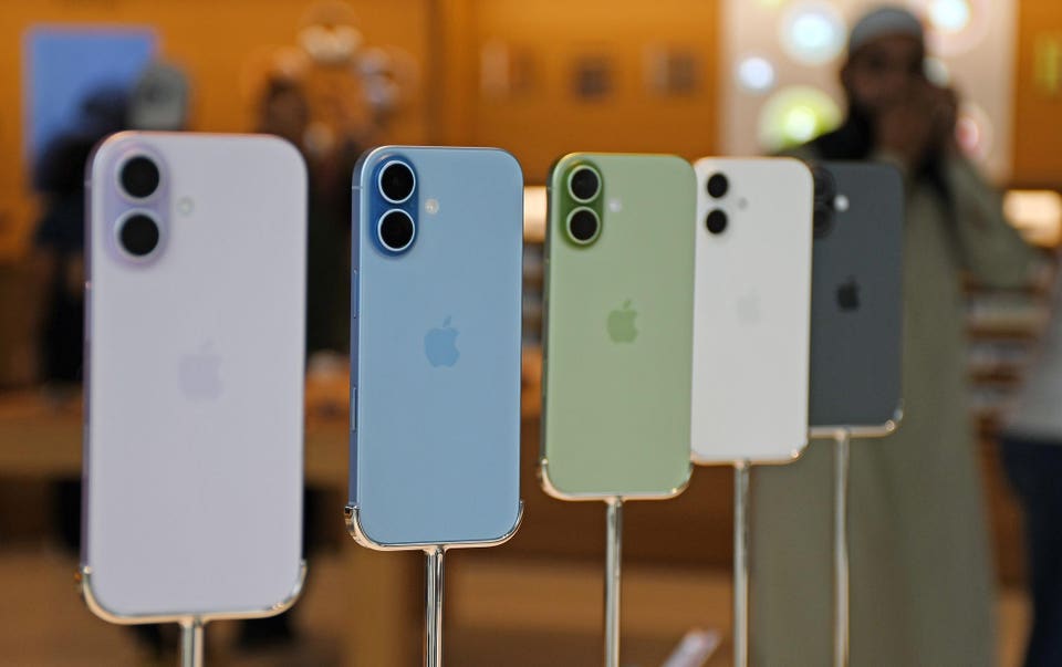 Models of iPhone 17 series mobile phones seen on display...