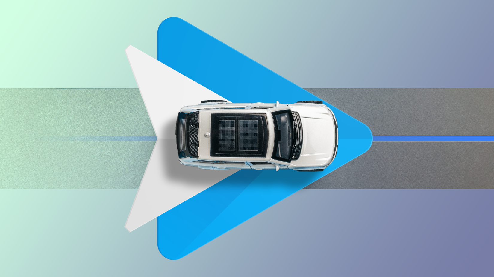 Top view of a car driving over the Android Auto logo