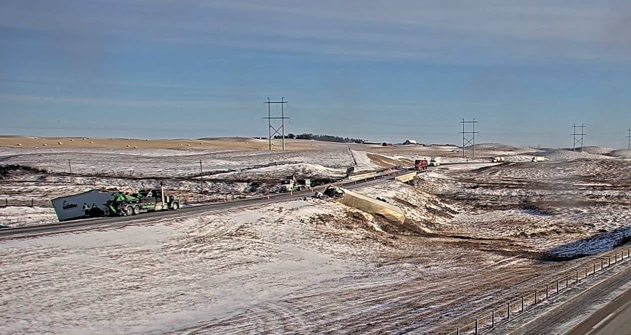 Crashed semi trailer in highway median and ditch