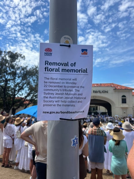 Sign detailing removal of floral memorial from Bondi pavilion