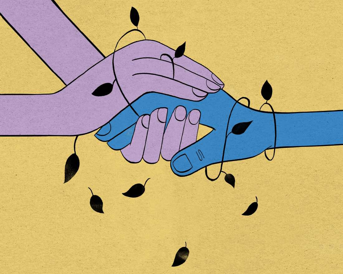 An illustration shows a close-up of clasped hands. Two hands, which are light purple, come in from the left side of the frame. The purple hands clasp a blue hand which comes in from the right side of the frame. They are wrapped in a black leafy vine which is shedding leaves, and they are viewed against a light yellow backdrop. 