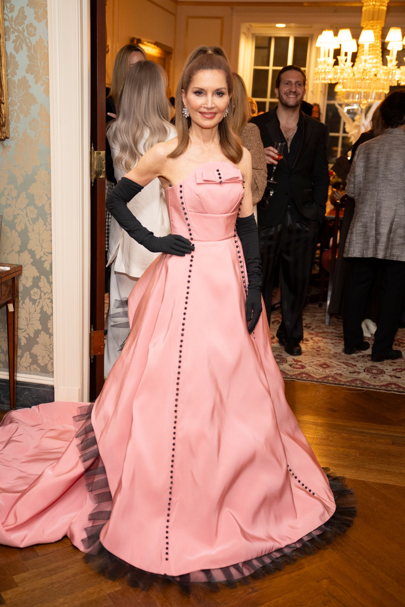 Image may contain Matthew Robinson Clothing Dress Formal Wear Person Fashion Gown Glove Evening Dress and Wedding